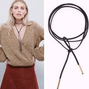 Suede string necklace with gold tips